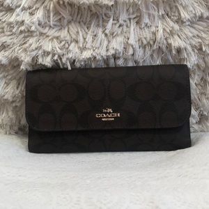 coach dark brown and black expanding wallet